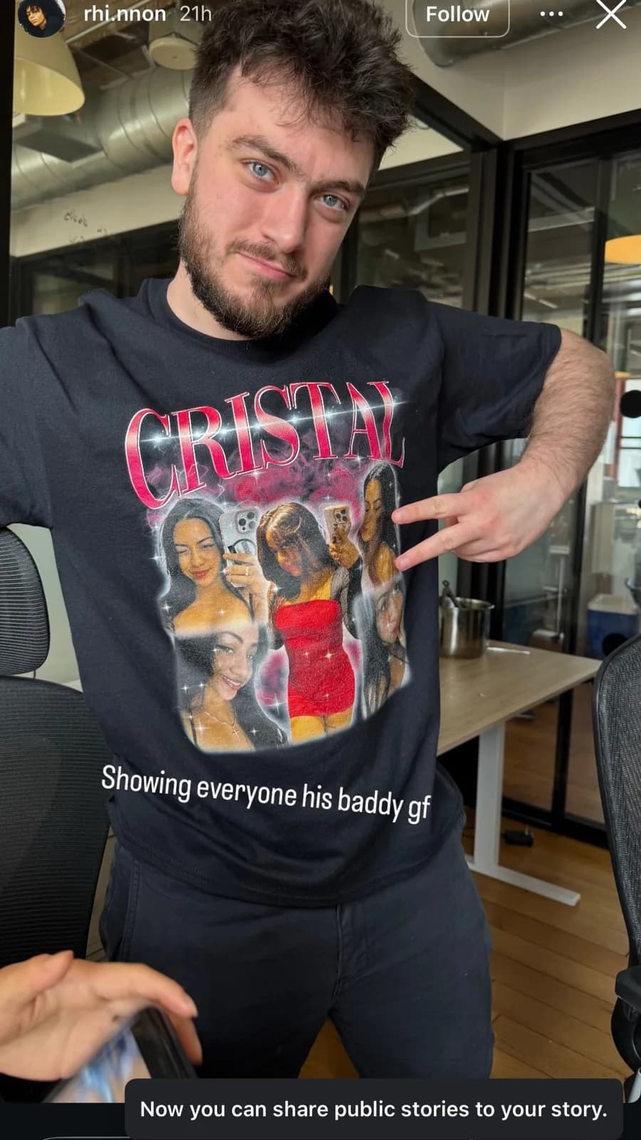 Michalis pointing at his CRISTAL t-shirt